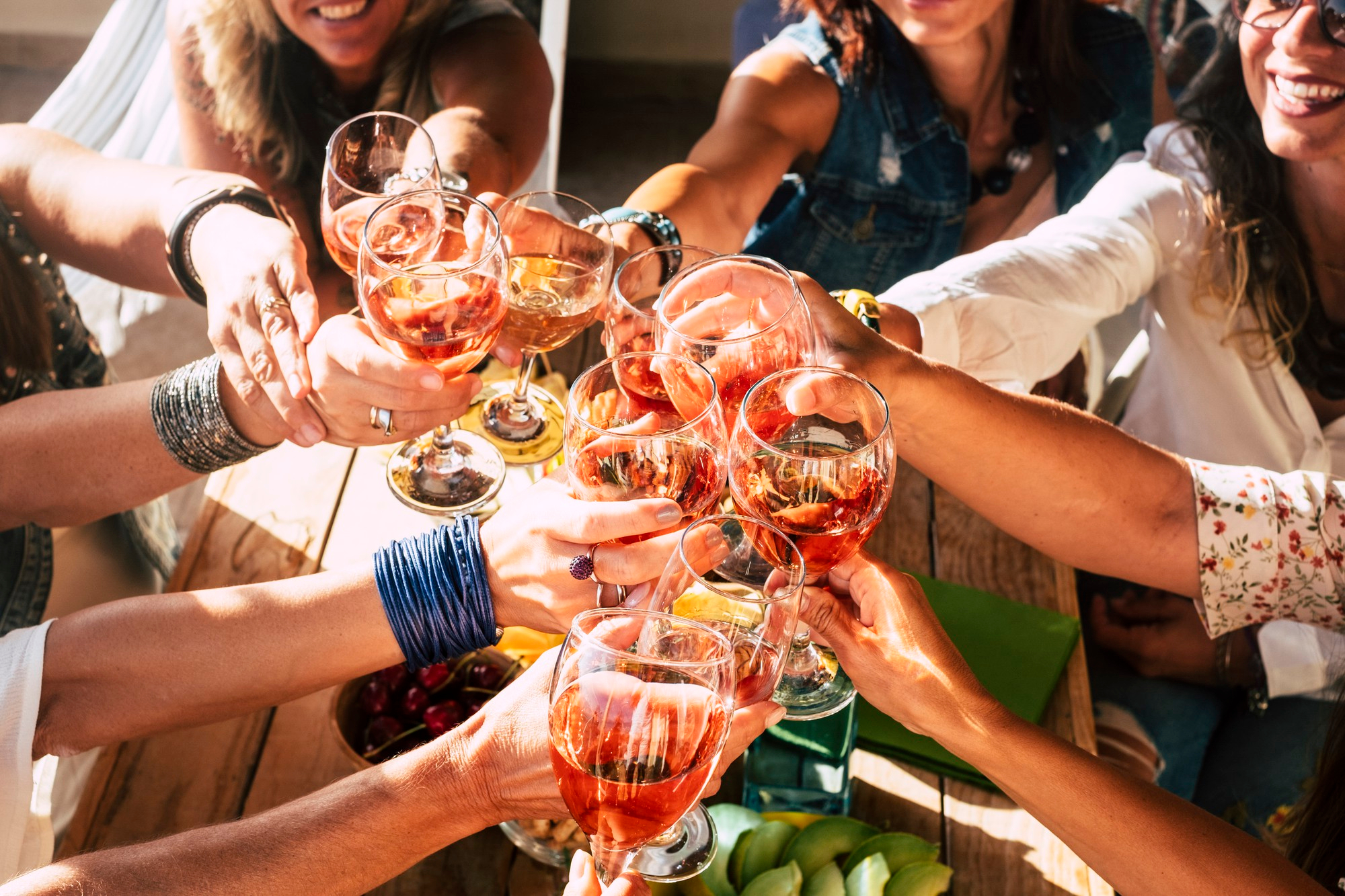 happy-cheerful-group-people-females-young-friends-together-cheering-toasting-celebrating-with-red-wine(1)
